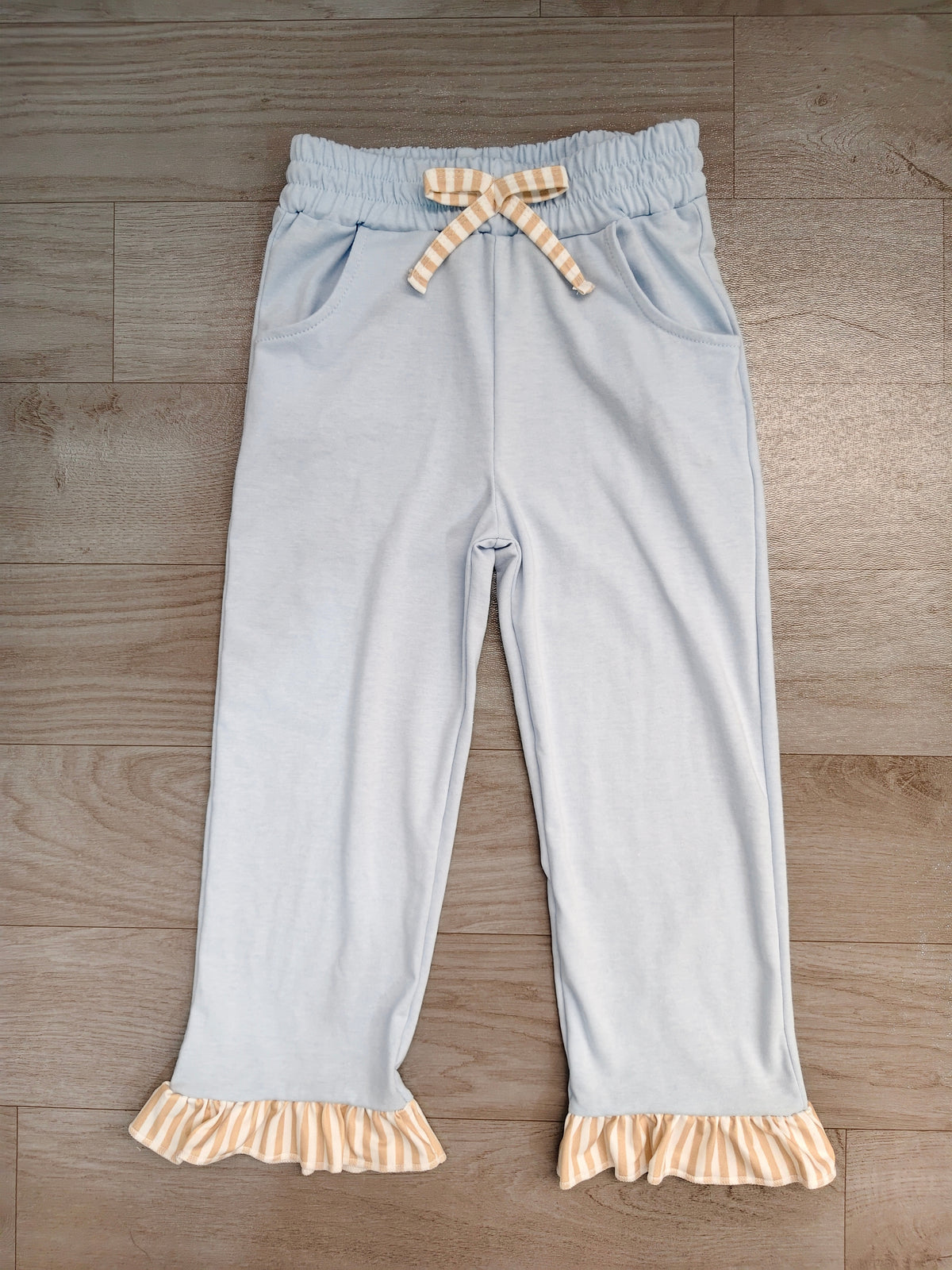 P1152 Preorder Baby Girls Light Blue Ruffle Pocket Pants